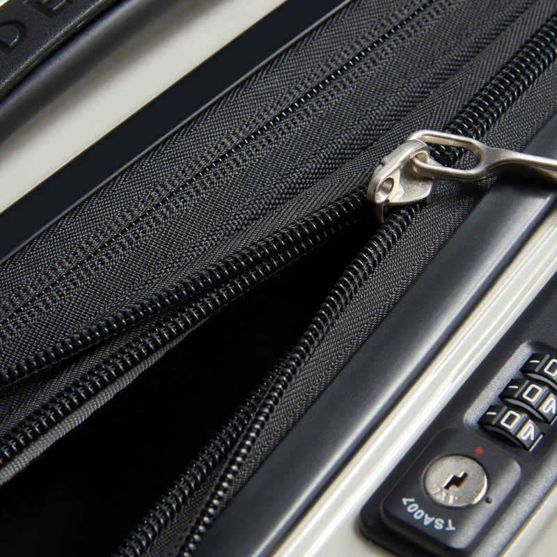 Delsey Paris Shadow 5.0 - 4-Rollen-Kabinentrolley mit Vordertasche S 55 cm erw. USB (elfenbein)