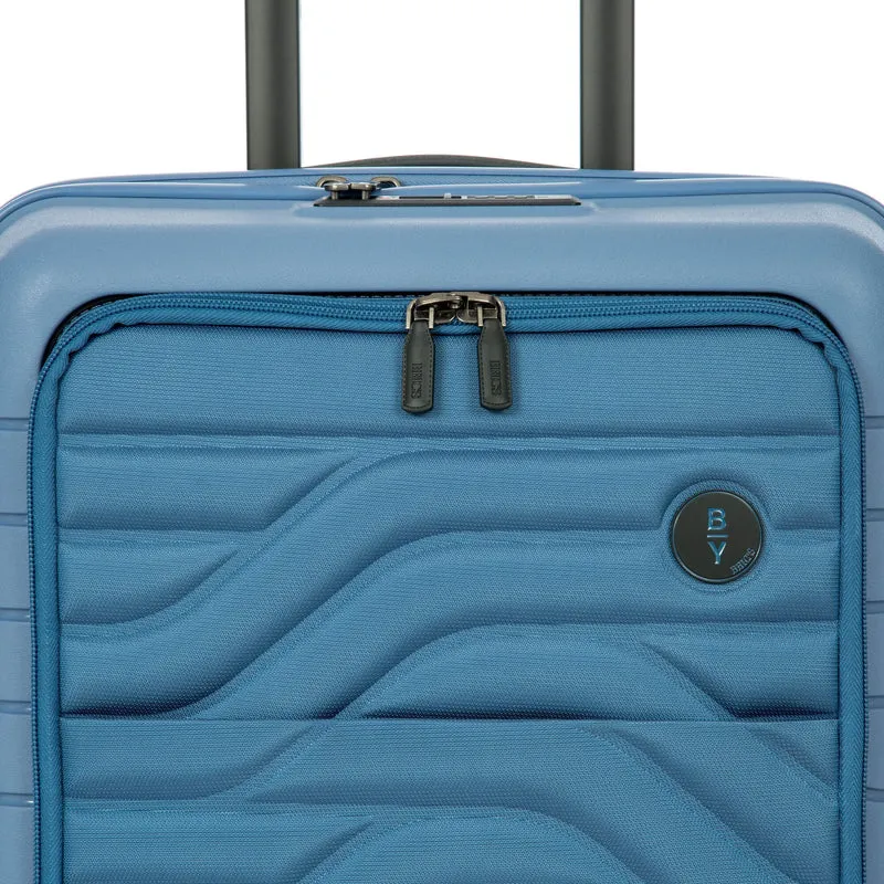 Brics BY Ulisse - 4-Rollen-Kabinentrolley mit Vortasche 55 cm erw. USB (grey blue)