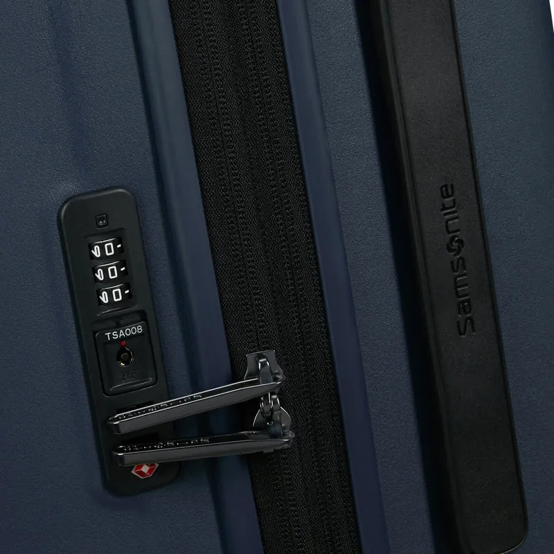Samsonite Selection Restackd - 4-Rollen-Trolley 81 cm XL erw. mit 3tlg. Packsack-Set (midnight)